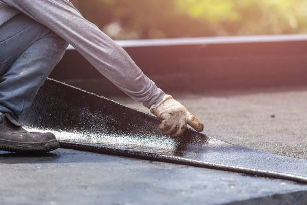 Professional Waterproofing technician working in Farmingdale, NJ